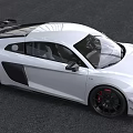 White Audi R8 Two Door Coupe With Black Wheels Red Brake Calipers And Sporty Spoiler