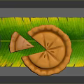 Delicious Orange Sliced Pie Served On Fresh Green Leaf Mat With Golden Crust