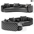 Beige Curved Sectional Sofa With Brown White Pillows And Woven Ball Decor