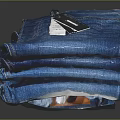 Blue Denim Jeans Stacked Folded With Brand Tag Fashion Apparel Item