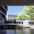 Urban Architectural Complex Featuring Traditional Black Tile Roofs And Modern Glass Curtain Walls