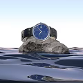 Elegant Luxury Watch Resting on Rock Over Water Surface with Gradient Blue Pink Sky