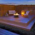 Outdoor Garden Landscape With Wooden Patio Sofa Chair Fire Pit And Lit Lantern