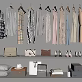 Hanging Clothes With Handbags Shoes And Storage Baskets On Closet Shelves