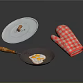 Kitchen Cooking Tools Setup With Frying Pan Fried Egg Lid And Checkered Oven Mitt