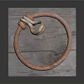 Rusty Iron Ring Placed On Wooden Board As Decorative Household Item