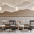 Modern White And Black Public Chairs In Cafe With Curved Line Wall And Hanging Lamps