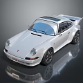 White Classic Porsche Sports Car With Rear Spoiler And Black Shiny Wheels