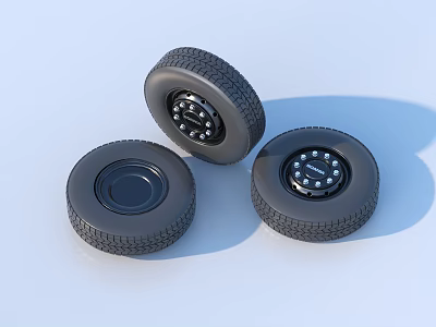 Black Rubber Tires With Three Wheel Rims And Visible Tread Patterns 3d model