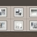 Six Framed Abstract Paintings in Two Rows Three Columns on Light Wall with Herringbone Floor