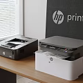 HP Office Printers Black And White Models On Wooden Office Desk For Workplace Use