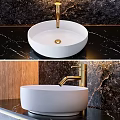 Luxury Modern Bathtub In Bathroom With Round Illuminated Mirror Gold Accents And Gray Marble Countertop