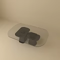 Sleek Modern Coffee Table Featuring Glass Top And Black Dual Pedestal Base