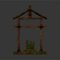 Traditional Wooden Architectural Structure With Thatched Roof And Stone Well Basin On Square Base