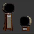 Two Computer Monitors With Wooden Stands In Different Sizes And Retro Design Elements