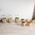 Assorted Fresh Vegetables in Handwoven Bamboo Baskets on Light Wooden Floor with Decorative Branch