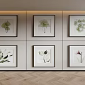Six Botanical Paintings in Black Frames on Light Colored Wall with Wooden Floor Modern Decor