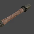 Vintage Military Weapon Featuring Cylindrical Metal Top And Wooden Handle Design