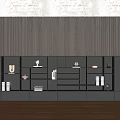 Modern Black Bookcase With Vertical Striped Panel And Layered Design For Books And Decorative Items