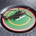 Modern Helicopter Parked On Green Helipad With Yellow Red Lines And Rotors