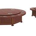 Round Brown Dining Tables In Two Different Sizes With Gold Accents And Circular Recesses