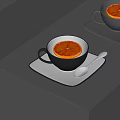 Stylish Black Cup With Black Tea And Orange Slice On White Saucer And Spoon