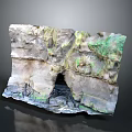 Layered Natural Rock Formation With Green Moss Covered Surface And Small Cave