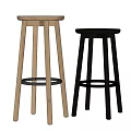 Modern Bar Stools In Light Wood And Black With Round Seats And Footrests