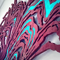 Abstract Red And Blue 3D Textured Wall Decor In Modern Living Room With Green Plant