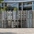 Multiple Modern Glass Elevators in Commercial Building Exterior With Sleek Metal Frames