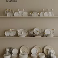 Elegant Modern Dinnerware Set Display With Plates Glasses Bowls On Shelves