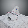 White High Top Canvas Shoes With Blue Star Logo Red Trim On Marble Cube