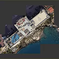 Luxurious Cliffside Building With Classical Design Multiple Windows Balconies And Blue Water View