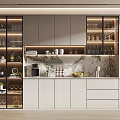 Modern Kitchen Wine Cabinet With Glass Doors And Illuminated Shelves Displaying Wine Glasses And Bottles