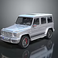 Silver Mercedes G Class SUV With Bold Design And Red Accent Wheels
