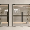 Modern Double Glass Doors With Black Frame Potted Plants And Light Wall