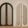 Black And White Double Arched Doors With Ribbed Glass And Golden Handles