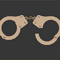 Detailed Golden Handcuffs With Metallic Shiny Finish On Reflective Surface