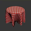 Round Dining Table With Red And White Checkered Tablecloth And Wooden Legs