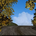 Road Facilities With Dirt Road Autumn Trees Blue Sky And White Clouds
