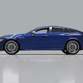 Blue Sports Sedan With Sleek Aerodynamic Body Sporty Front Grille And Alloy Wheels