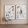 Abstract Art Wall Decor With Black White Paintings Gray Chair And Hanging Lamp