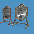 Pair Of Shield Shaped Stands With Gold And Brown Finish On Blue Background