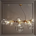 Modern Chandelier with Transparent Glass Balls and Golden Hoops Illuminated Design