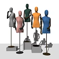 Five Different Colored Mannequins Standing On Various Pedestals Against Light Blue Background