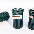 Green Public Trash Bins With Red Labels For Outdoor Areas