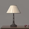 Classic Table Lamp With Striped Lampshade And Metal Base On Wooden Table