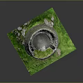 Ancient Stone Circular Building Ruins With Green Grass And Open Center