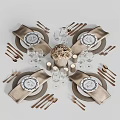 Elegant Dinnerware Set With Plates Cutlery Wine Glasses Napkins Candles And Flower Bouquet