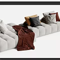 Gray Sectional Sofa With Decorative Pillows And Burgundy Blanket For Living Room